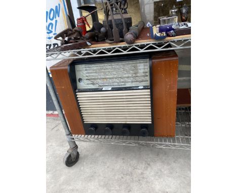 A VINTAGE ULTRA WOODEN CASED VALVE RADIO 