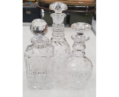 THREE VINTAGE CUT GLASS DECANTERS 