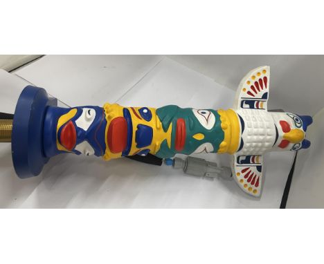 AN AZTEC DESIGN TOTUM BEER PUMP 