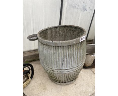 A VINTAGE GALVANISED DOLLY TUB (HOLES TO BASE) 
