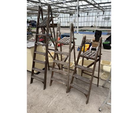THREE VARIOUS VINTAGE WOODEN STEP LADDERS 