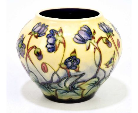 EMMA BOSSONS FOR MOORCROFT; a squat bowl decorated in the 'Hepatica' pattern, height 11cm.Condition Report: Light glaze crazi