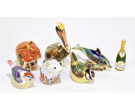 ROYAL CROWN DERBY; six animal form paperweights, including 'Pelican', 'Baby Bottlenose Dolphin', etc., also a Royal Crown Der