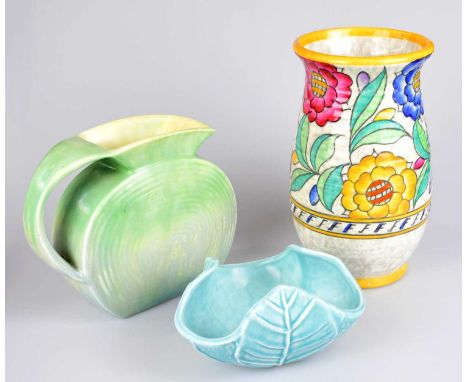 CHARLOTTE RHEAD FOR CROWN DUCAL; a ribbed cylindrical vase with ribbed neck decorated in the 'Rhodanthe' pattern, signed, hei