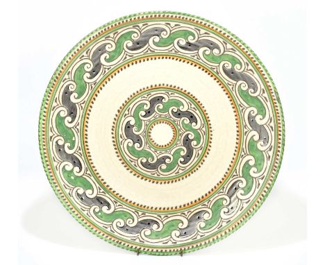 CHARLOTTE RHEAD FOR CROWN DUCAL; a large circular wall charger decorated in the green chain pattern, diameter 44cm.Condition 