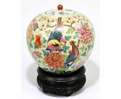 A 19th century Chinese globular Famille Rose jar and cover, painted throughout with floral sprays and exotic birds, unsigned,