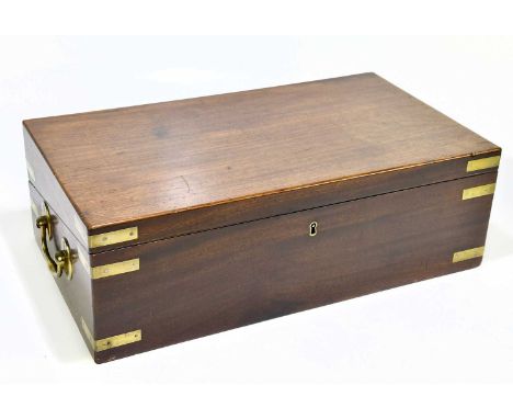A 19th century brass bound mahogany campaign writing slope, the hinged cover enclosing baize material and fitted compartments