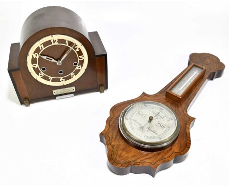 An ealy 20th century walnut aneroid barometer, height 54cm, together with an oak case mantel clock.