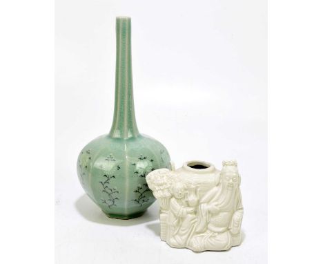 A Korean globe and shaft vase, decorated with flowers against a celadon ground, height 27.5cm, with a Chinese moulded teapot 