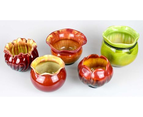 BRETBY; five small planters, each of shaped circular form to include a moulded example with wavy rim, decorated in shades of 