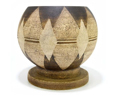 AVRIL BENNETT FOR TROIKA POTTERY; a globe vase with diamond decoration on a brown ground, signed 'Troika Cornwall' and with p