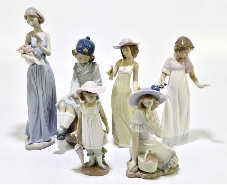 NAO; a group of six ceramic figures to include a girl reading seated upon a barrel, shape number 1401, a girl with a parasol,