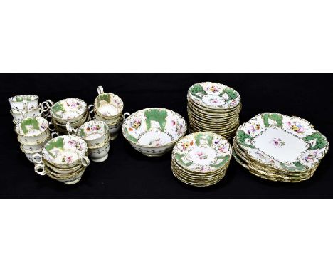 A 19th century Rockingham style fifty piece part tea service, comprising four sandwich plates, nine white tea cups, twelve sm