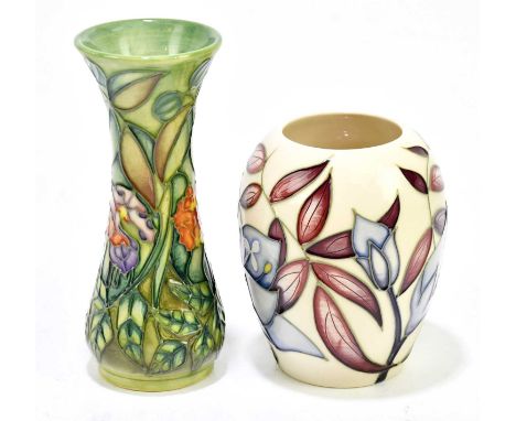 SALLY TUFFIN FOR MOORCROFT; a small waisted vase decorated in the 'Rainforest' pattern, height 13cm, together with a squat Mo