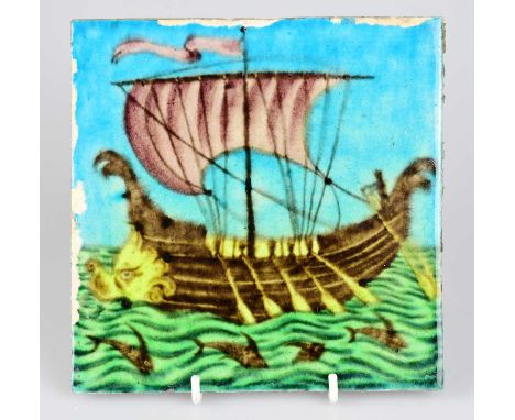 WILLIAM DE MORGAN; an Art Pottery tile painted with a galleon ship and five sailors with paddles, with fish swimming below th