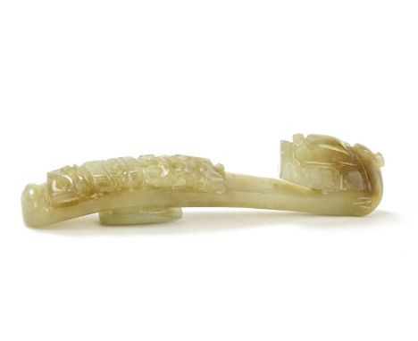 A Chinese carved jade belt hook, length 8.75cm. 