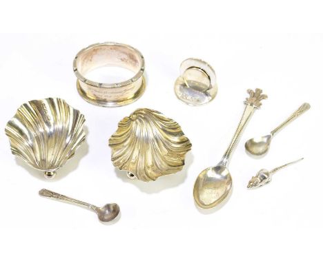 A small quantity of hallmarked silver including a menu holder, Sampson Mordan, Chester, 1903, a small pair of shell shaped di