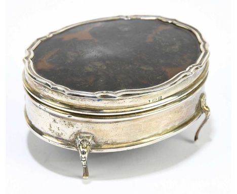 A George V hallmarked silver and tortoiseshell oval trinket box, Birmingham 1919, length 8.5cm.Condition Report: The leather 