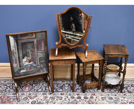 A 1920s oak side table on barleytwist columns, with two recesses housing later Spode plates, height 53cm, together with two f