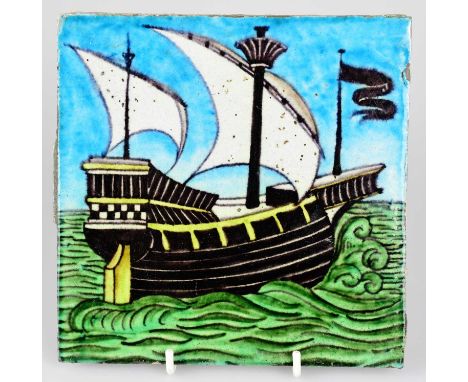 WILLIAM DE MORGAN; an Art Pottery tile, painted with a galleon with two sails in shades of blue, white, black, yellow and gre