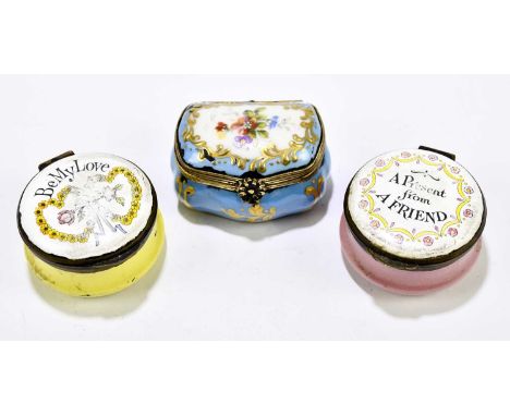 Three enamel pill boxes, one inscribed 'Be My Love', and another inscribed 'A Present from a Friend'.