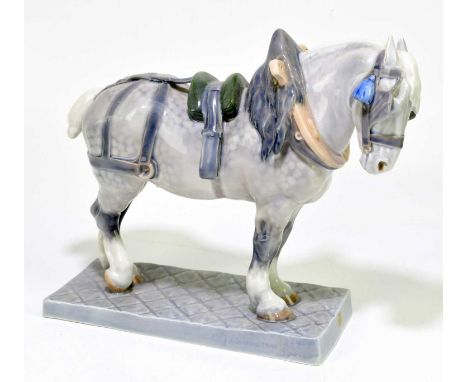 ROYAL COPENHAGEN; a large ceramic model of a shire horse, model 471, signed CJ Buenesen and numbered 8-4-2 to the bottom righ