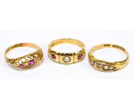 Two 18ct gold gem set rings, size N and J, combined weight 4.6g, with a 15ct gold gem set ring, gross weight 2.3g.