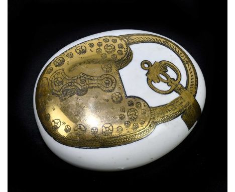 A Fornasetti lock and key ceramic paperweight.Condition Report: Wear to the gilding, surface wear and scratches, otherwise go