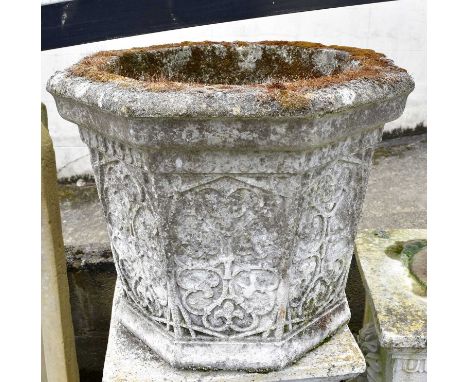 A reconstituted stone garden planter, with lace detailing, height 42cm. 