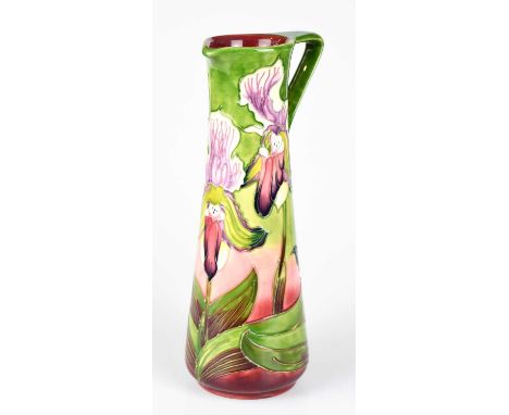 PHILIP GIBSON FOR MOORCROFT; a limited edition ewer, decorated with orchids, numbered 20/250, height 25cm, boxed.Condition Re