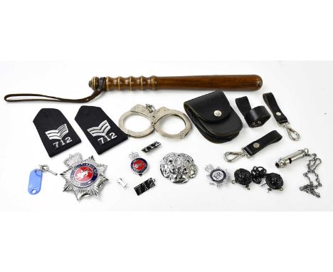 CIVILIAN POLICE INTEREST; a collection of police items, 1970's / 1980's, comprising a truncheon, with leather torch holster, 