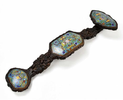 A contemporary Chinese carved wooden Ruyi sceptre, set with three cloisonné floral decorated plaques, length 54.5cm. Conditio