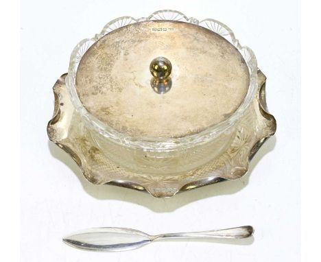 HARRISON FISHER; an Edward VII cut glass butter dish with hallmarked silver cover and stand, of circular fluted form, the sil