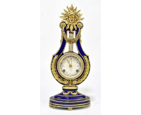 A V&amp;A Marie Antoinette ceramic clock, with Roman numerals, height 39cm.Condition Report: Tarnishing to the handles and ba
