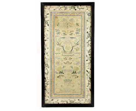 An early 20th century Chinese embroidered silk panel, decorated with exotic birds, insects inside floral detail, 65 x 31cm, f