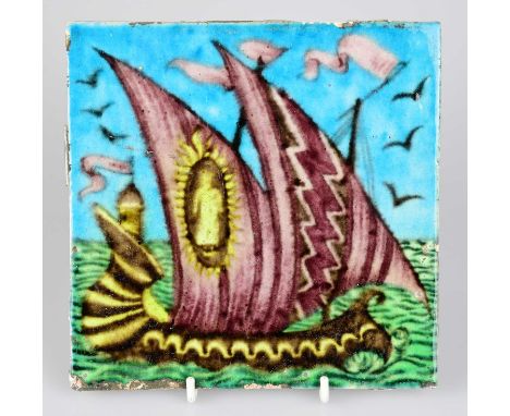 WILLIAM DE MORGAN; an Art Pottery tile painted with a two masted sailing vessel in shades of purple, blue, black and yellow, 