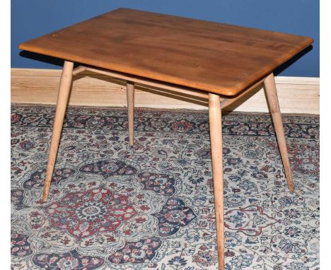 ERCOL; a light elm side table of rectangular form with undertier shelf, on turned column supports, width 99cm, depth 67cm, he