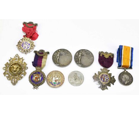 A collection of hallmarked silver and silver plated medals, including a hallmarked silver and enamel example, Cardiff &amp; C