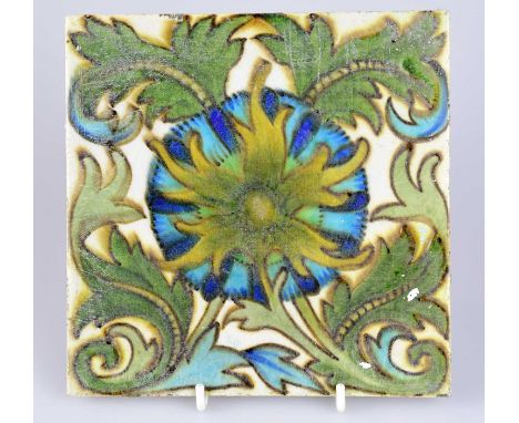 ATTRIBUTED TO MAW &amp; CO; an Art Pottery tile painted with floral decoration, in shades of green, blue, and yellow, 15.5 x 