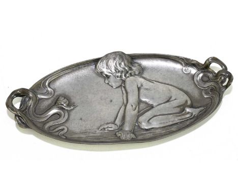 WMF; a pewter dish of oval form relief decorated with a girl on her knees gazing at a snail, length 27cm, embossed number 210