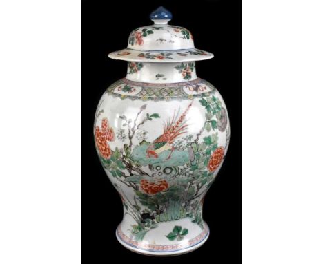 A 19th century Chinese Famille Verte Wucai porcelain temple jar and cover painted with a band of auspicious symbols above phe