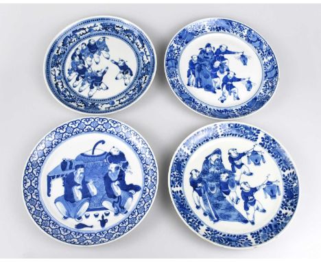 Four late 19th century Chinese blue and white porcelain plates to include a near pair of an elder with four boys, two holding