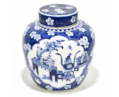 A 19th century Chinese blue and white porcelain ginger jar and cover decorated with objects inside prunus flowers, bears Kang