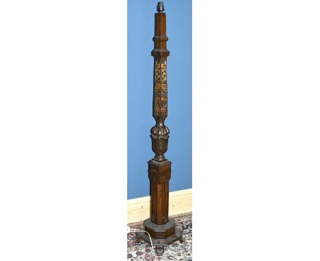 A 1920s/30s carved oak standard lamp on stepped plinth base, height 178cm, formerly a bed post.