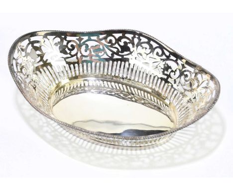 MAPPIN &amp; WEBB; a sterling silver basket of shaped oval form with cast beaded rim above a pierced body, length 20.5cm, app