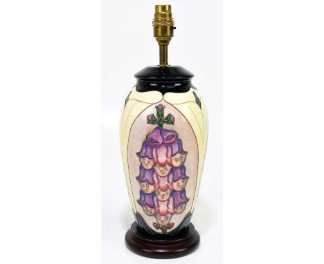 RACHEL BISHOP FOR MOORCROFT; a table lamp decorated in the 'Foxglove' pattern, height including fitting 38cm, together with a