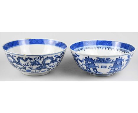 Two 19th century Chinese blue and white porcelain footed bowls comprising an example decorated with four claw dragons chasing