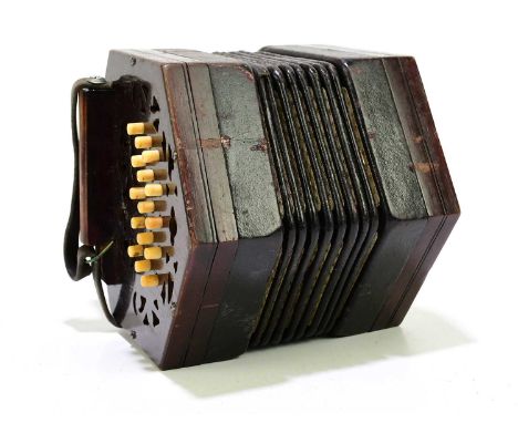 A late 19th century thirty-one key concertina, probably by Lachenal, with original case. Condition Report: There is some dama
