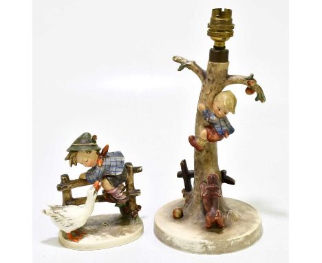 GOEBELS; a Hummel table lamp representing a dog barking at a boy climbing a tree, height 30cm, together with a further Hummel