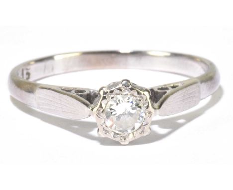 An 18ct white gold illusion set diamond solitaire ring, the diamond weighing approx 0.20ct, size M 1/2, approx 2.2g.Condition